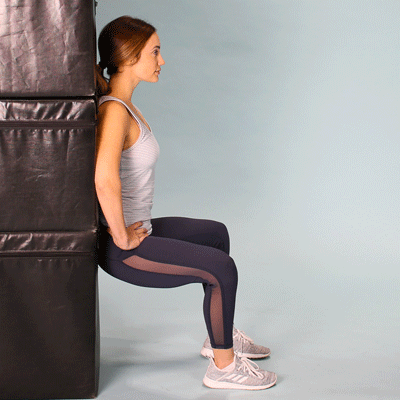 Knee Extensions in a Wall-Sit Position