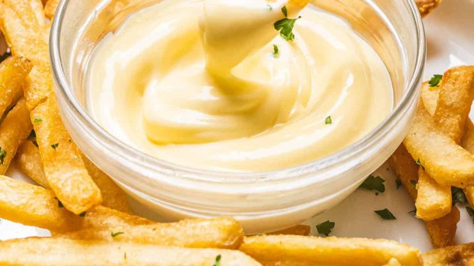 Preparation of Garlic Aioli serve with french fries