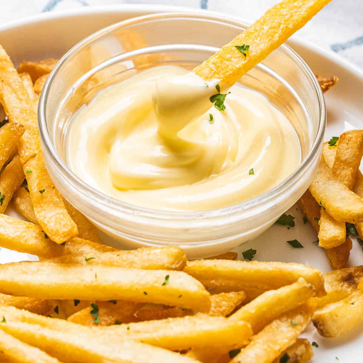 Preparation of Garlic Aioli serve with french fries